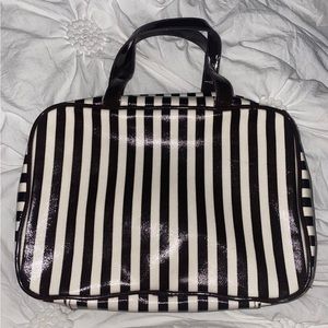 Retired Henri Bendel cosmetic bag. Gentle used.